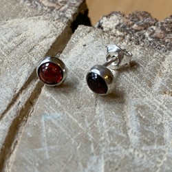 Silver stud earrings with garnets