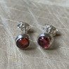 Silver stud earrings with garnets