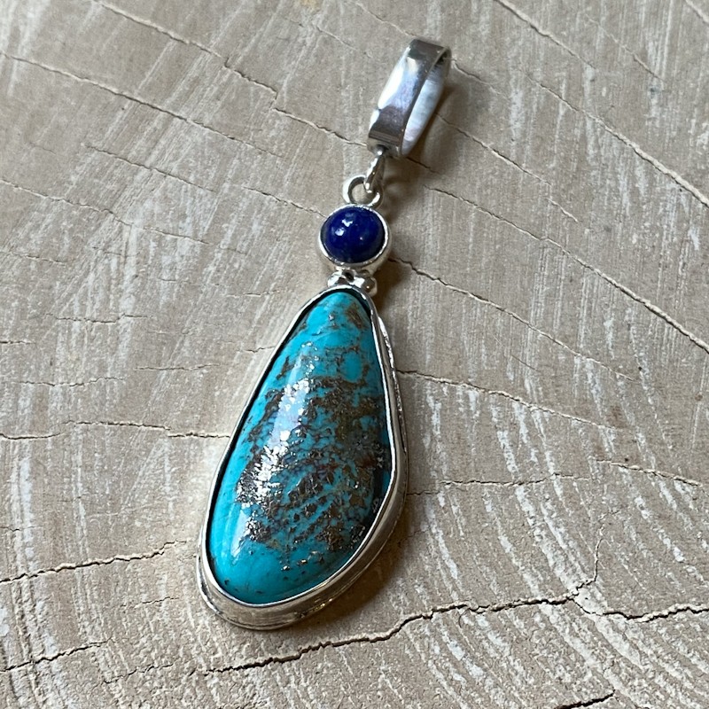 Silver pendant with turquoise