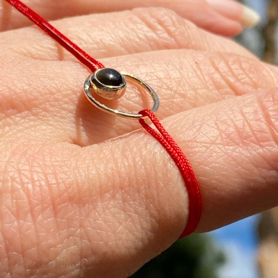 Gold bracelet with obsidian