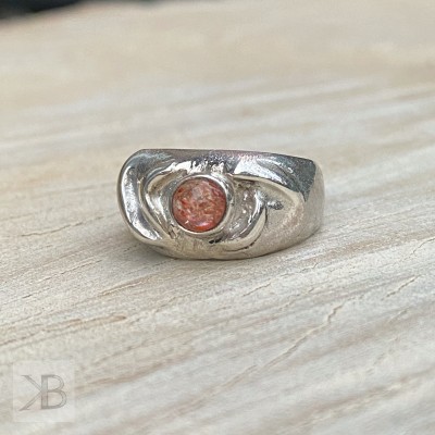Silver ring with a sunstone