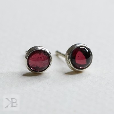 Silver stud earrings with...