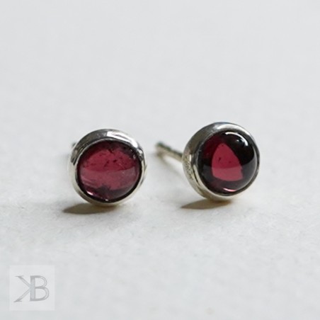 Silver stud earrings with garnets