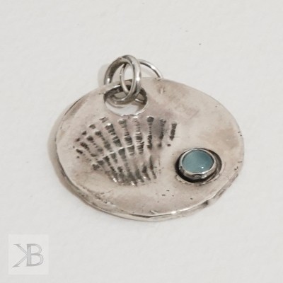 Silver pendant with a shell