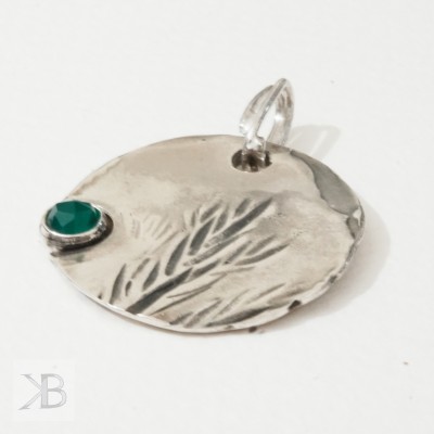 Silver pendant with green...