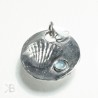 Silver pendant with a shell